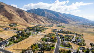 View of mountain background featuring nearby suburban area