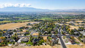 Aerial view of residential area with a mountainous background
