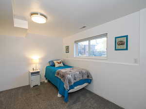 View of carpeted bedroom