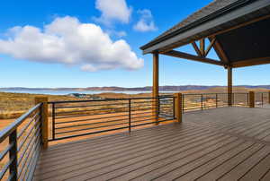 Wooden deck featuring a mountain view