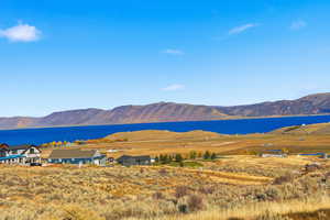 Mountain view featuring a nearby body of water