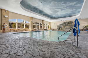 Indoor pool with a patio
