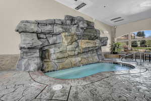 View of swimming pool with a patio