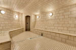 Bathroom with a sauna / steam room and tile patterned floors