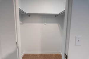 View of spacious walk-in closet
