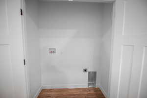 2nd floor Laundry room with LVT flooring, washer hookup, and electric dryer hookup