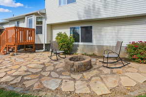 View of patio / terrace with a fire pit