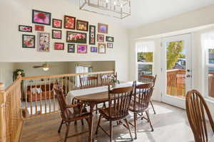 Dining space with wood finished floors