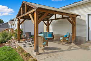 View of patio / terrace with a gazebo and outdoor lounge area