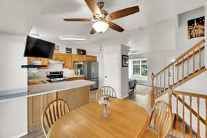Dining area featuring  a ceiling fan