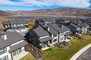 Aerial view of residential area with a water and mountain view