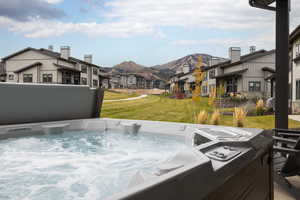 Exterior view of a mountainous background and a jacuzzi