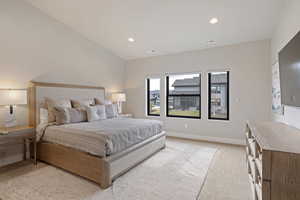 Bedroom featuring recessed lighting and light colored carpet