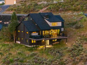 Rear view of property featuring a patio area