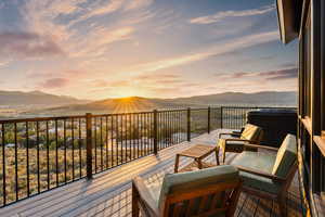 Deck at dusk with a mountain view