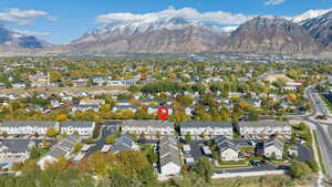 View of property location featuring a mountain backdrop and nearby suburban area