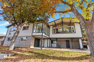Rear view of house with walk-out basement