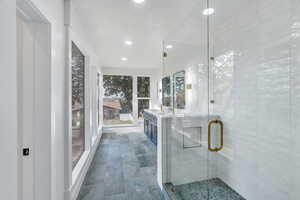 Bathroom has tons of natural light