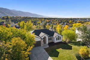 View of subject property with mountains