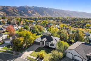 Aerial perspective of suburban area featuring mountains