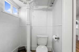 Bathroom featuring wood finished floors