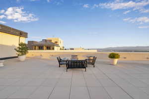View of patio featuring a mountain view