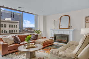 Living room with a glass covered fireplace