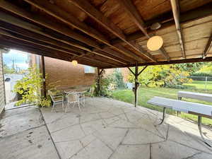 View of patio with outdoor dining space