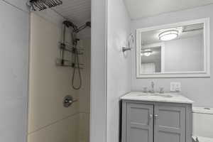 Full bathroom with vanity