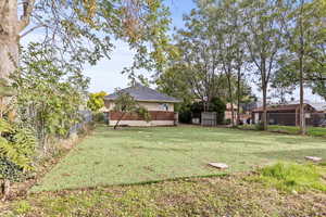 View of fenced backyard