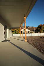View of patio featuring a mountain view