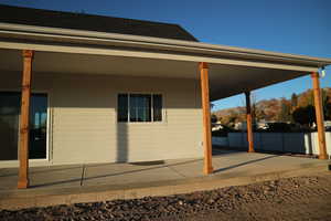 Exterior space featuring roof with shingles