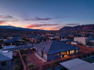 Aerial view at dusk of a residential view and a mountain view