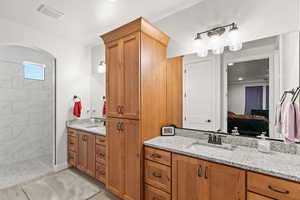 Ensuite bathroom with two vanities and walk in shower