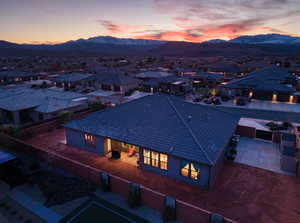 Aerial view at dusk of a residential view and a mountain view