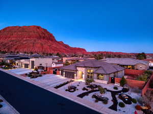 View of mountain background featuring nearby suburban area