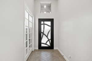 Entrance foyer featuring baseboards