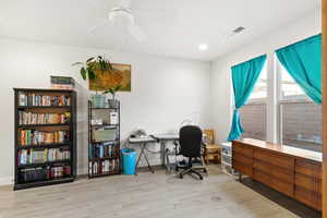Flex room area featuring wood tiled floors, recessed lighting, and a ceiling fan