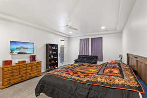 Bedroom with carpet flooring, a ceiling fan, and recessed lighting