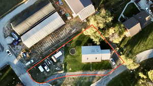 Aerial overview of property's location with property parcel outlined