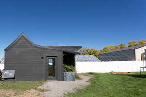 View of property exterior with a cooling unit