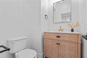 Bathroom with vanity and toilet
