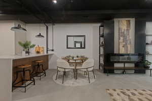 Dining area with concrete floors