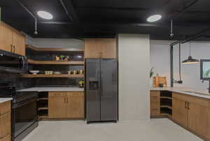 Kitchen featuring brown cabinetry, appliances with stainless steel finishes, open shelves, decorative backsplash, and decorative light fixtures