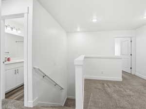 Stairway up to the bonus family room, that could be a playroom, office, or a sperate tv room.