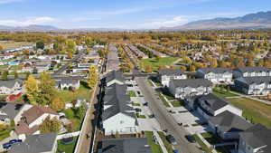 View of property location with a mountain backdrop and nearby suburban area
