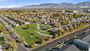 View of property location with a mountainous background and nearby suburban area
