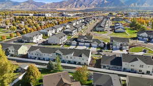 Aerial view of residential area with a mountain backdrop