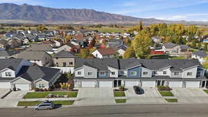 Aerial view of residential area with mountains