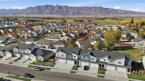 Aerial view of residential area featuring mountains